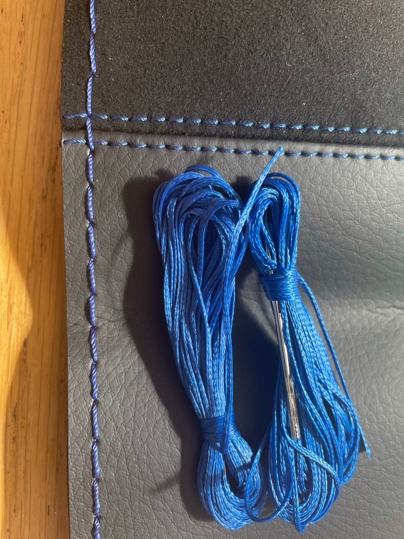 Braided steering wheel cover mid blue stitching