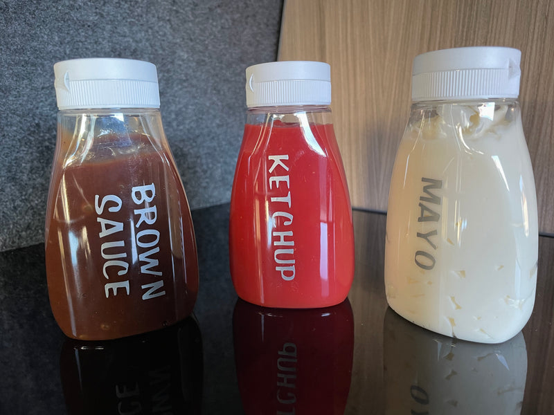 Travel condiment bottles