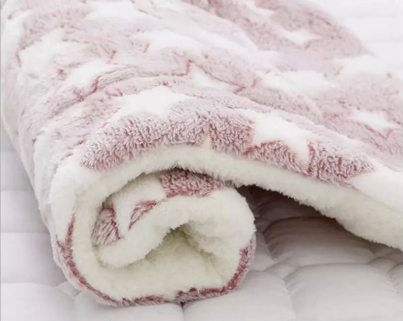 Pink padded dog blanket